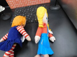 2 cloth dolls side